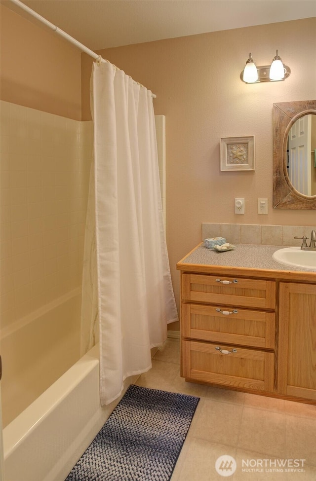 full bathroom with vanity, tile patterned floors, and shower / tub combo with curtain