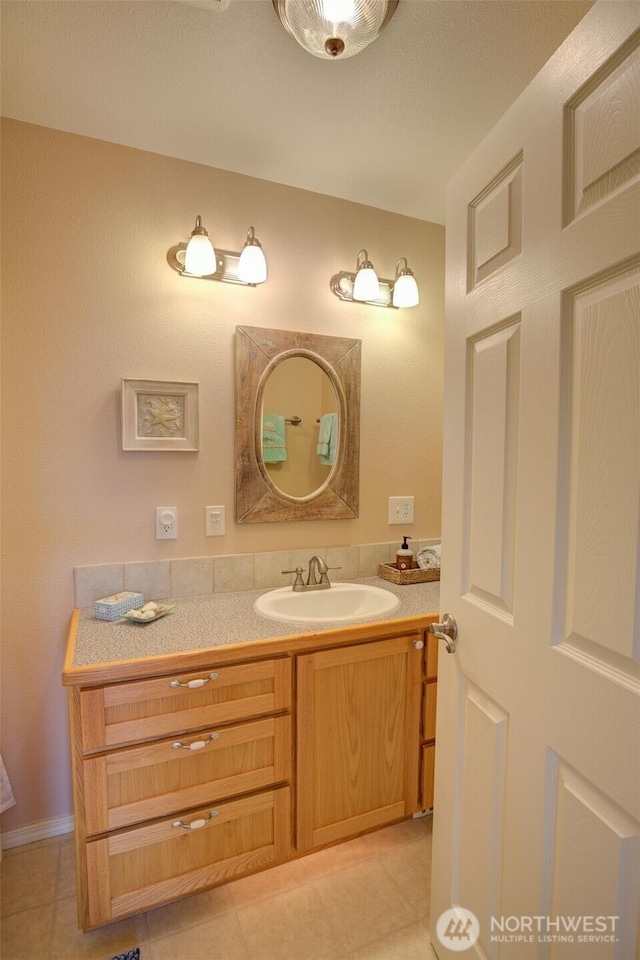 bathroom featuring vanity and tile patterned floors