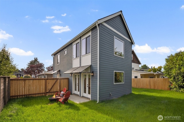 8116 12th Ave SW Unit B, Seattle, WA 98106 - rear view of property with a fenced backyard and french doors