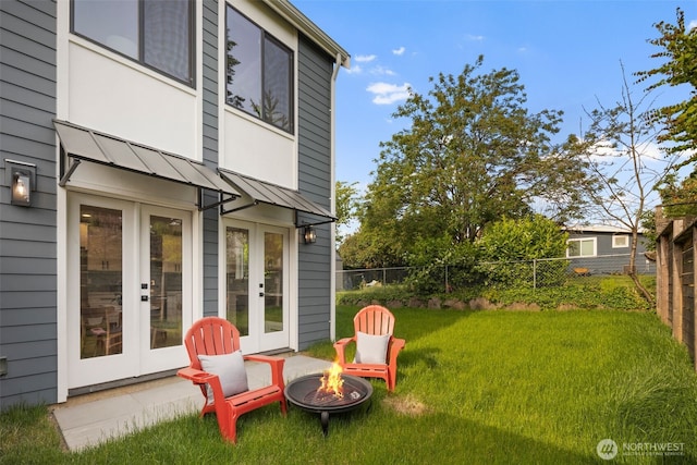 8116 12th Ave SW Unit B, Seattle, WA 98106 - view of yard featuring french doors and a fire pit