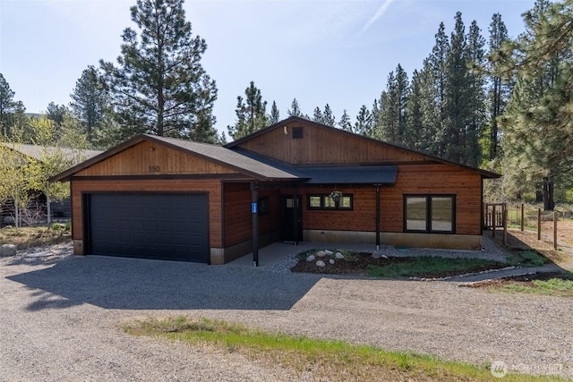 view of front facade featuring driveway and a garage