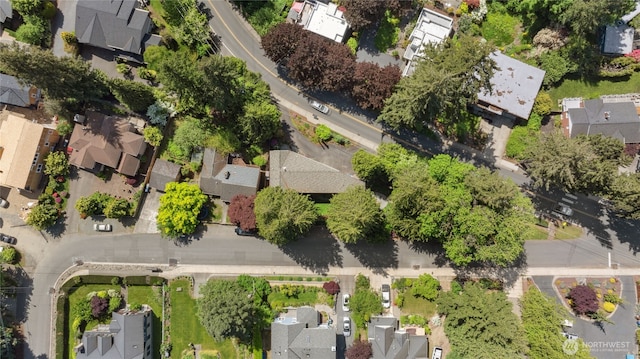 aerial view of property's location with nearby suburban area
