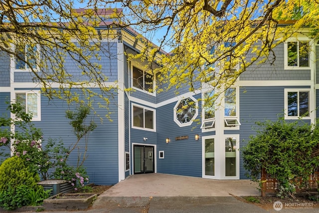 rear view of property with a patio