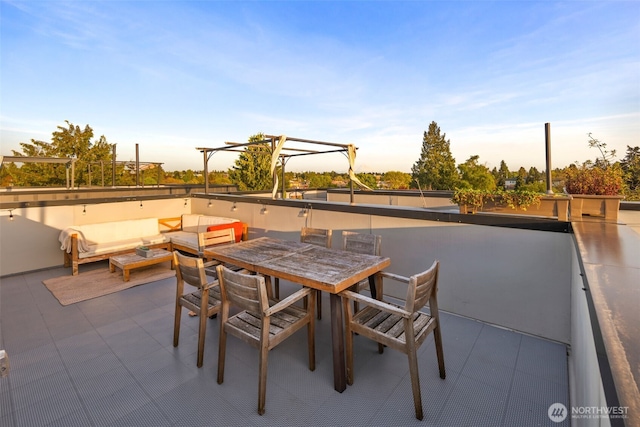 9429 18th Ave SW Unit A, Seattle, WA 98106 - patio terrace at dusk with an outdoor hangout area and outdoor dining area