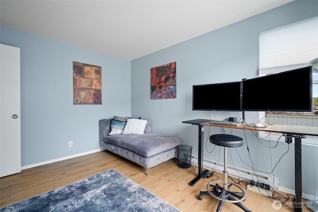 7806 Birch Bay Dr Unit 808, Blaine, WA 98230 - home office with wood finished floors, baseboards, and a baseboard heating unit