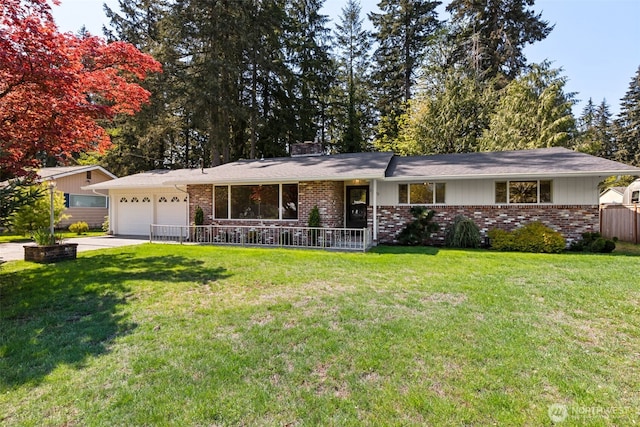 single story home with brick siding, an attached garage, and a front lawn