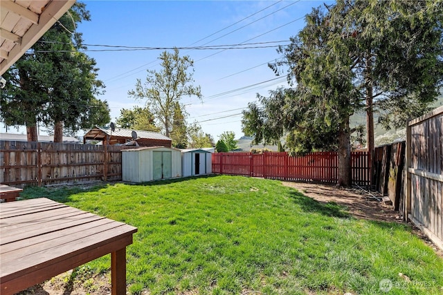 314 E Okanogan Ave, Chelan, WA 98816 - view of yard with a storage unit, an outdoor structure, and a deck