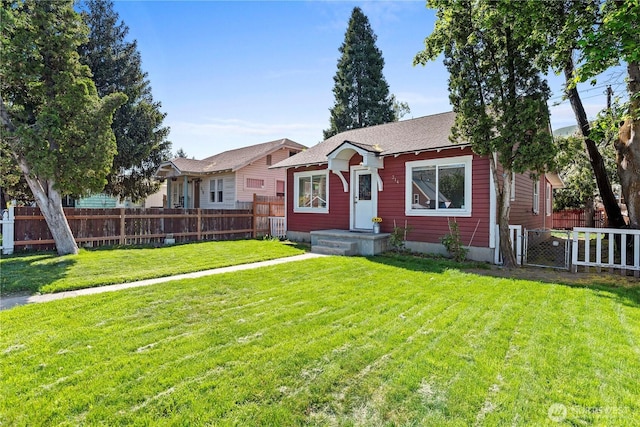 314 E Okanogan Ave, Chelan, WA 98816 - bungalow with roof with shingles and a gate
