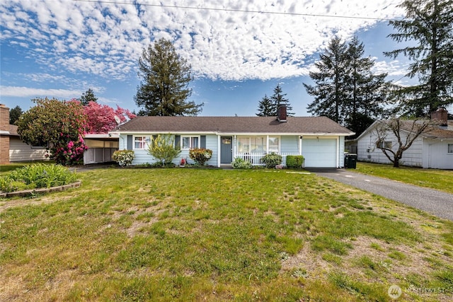 8803 Terrace Rd SW, Tacoma, WA 98498 - ranch-style home with asphalt driveway, a chimney, an attached garage, a front yard, and covered porch