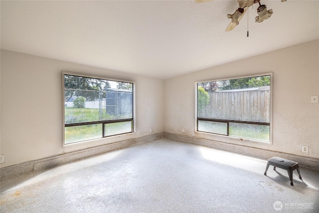 8803 Terrace Rd SW, Tacoma, WA 98498 - empty room with plenty of natural light and a ceiling fan
