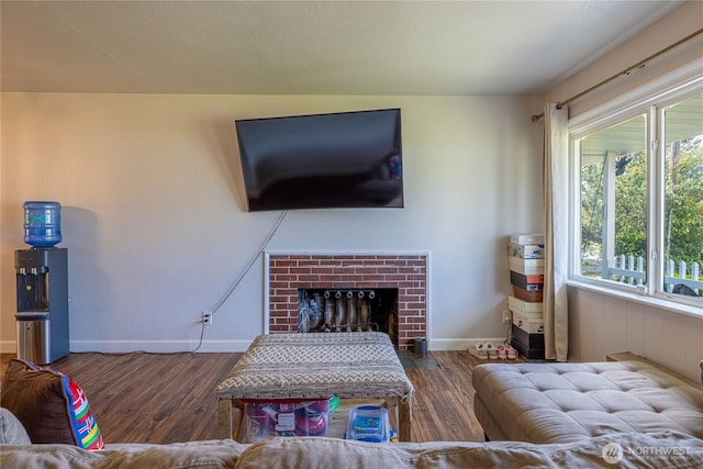 8803 Terrace Rd SW, Tacoma, WA 98498 - living area featuring wood finished floors, baseboards, and a fireplace