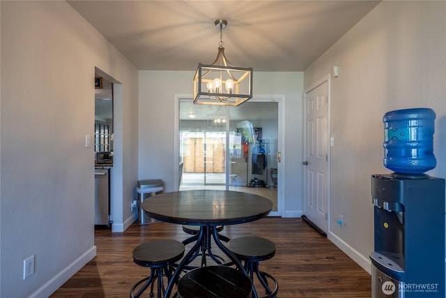8803 Terrace Rd SW, Tacoma, WA 98498 - dining room with a chandelier, baseboards, and wood finished floors