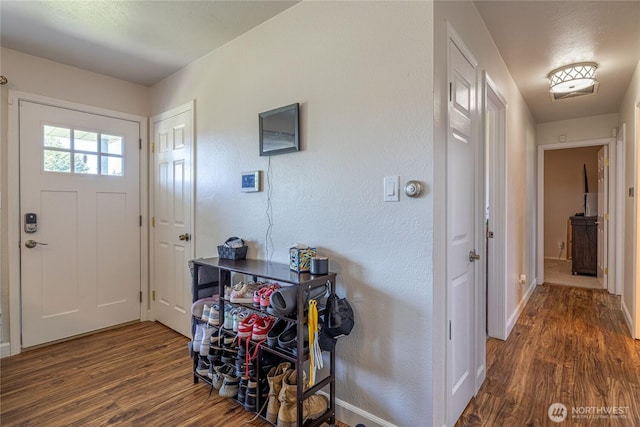 8803 Terrace Rd SW, Tacoma, WA 98498 - entryway with wood finished floors, baseboards, and a textured wall
