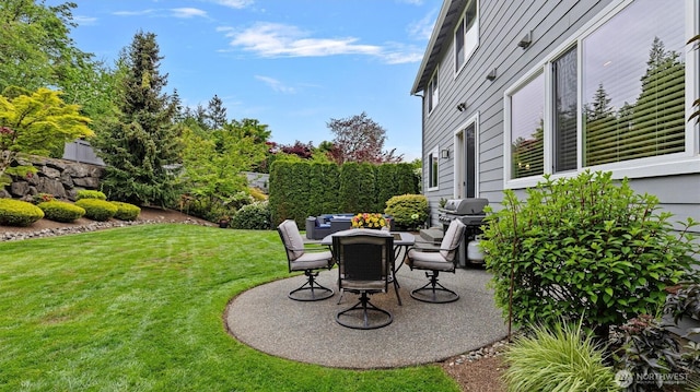 25413 NE 3rd Pl, Sammamish, WA 98074 - view of green lawn with a patio and outdoor dining space