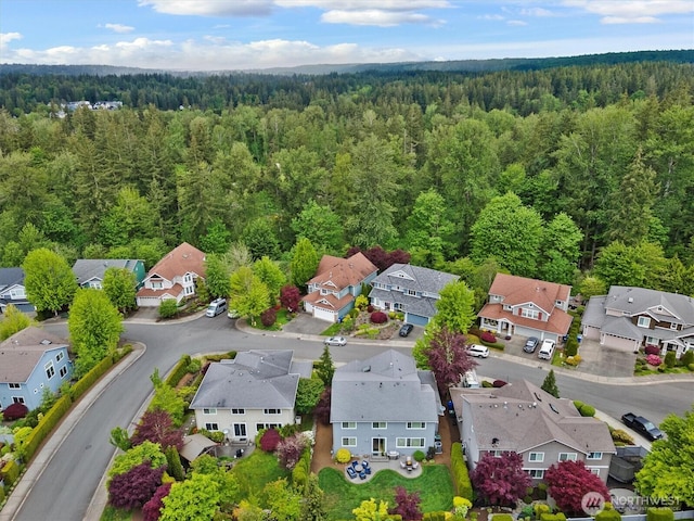25413 NE 3rd Pl, Sammamish, WA 98074 - aerial view of residential area with a heavily wooded area