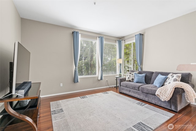 14519 1st Ln NE Unit 104, Duvall, WA 98019 - living area with dark wood finished floors, baseboards, and a desk