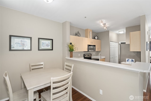 14519 1st Ln NE Unit 104, Duvall, WA 98019 - dining room with dark wood-type flooring and baseboards