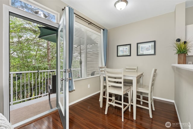 14519 1st Ln NE Unit 104, Duvall, WA 98019 - dining area featuring wood finished floors, baseboards, and french doors
