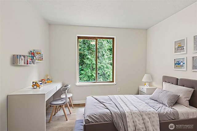 1027 Fishpond Rd, Kelso, WA 98626 - bedroom featuring light wood-style floors and baseboards