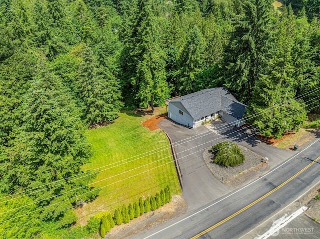 1027 Fishpond Rd, Kelso, WA 98626 - aerial view of property and surrounding area with a heavily wooded area