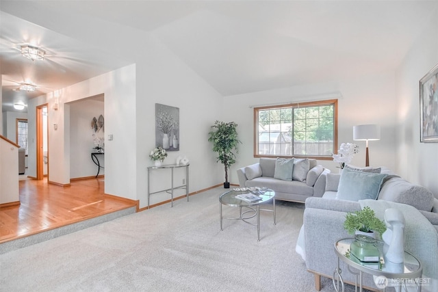 1742 N 122nd St, Seattle, WA 98133 - carpeted living area with lofted ceiling and baseboards