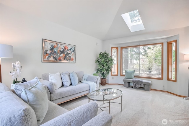 1742 N 122nd St, Seattle, WA 98133 - carpeted living room featuring a skylight, baseboards, and high vaulted ceiling