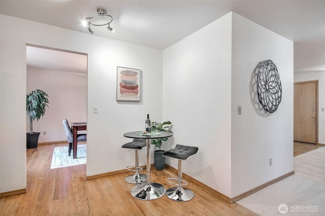 1742 N 122nd St, Seattle, WA 98133 - dining space with wood finished floors and baseboards