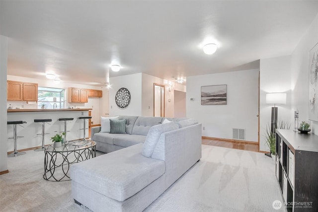 1742 N 122nd St, Seattle, WA 98133 - living room with light carpet and baseboards