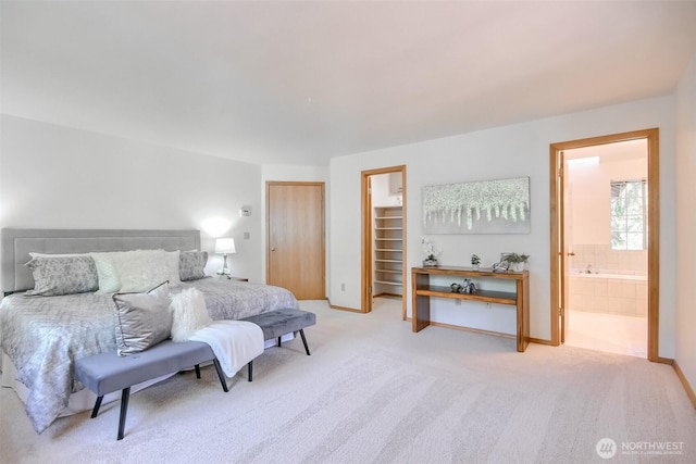 1742 N 122nd St, Seattle, WA 98133 - carpeted bedroom featuring baseboards, a closet, and ensuite bath