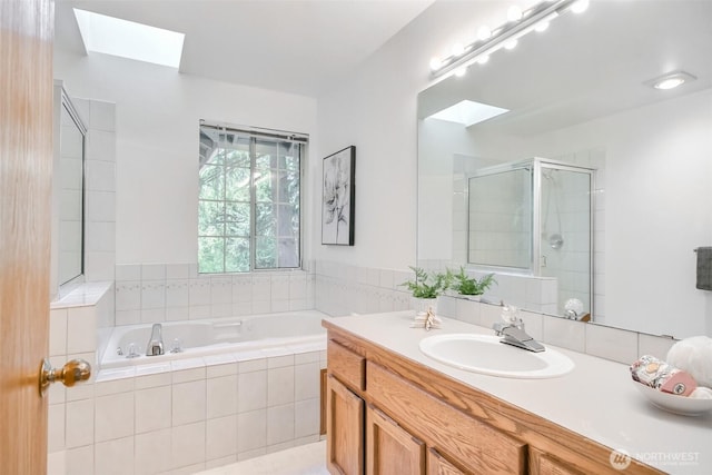 1742 N 122nd St, Seattle, WA 98133 - full bath with a skylight, a stall shower, a bath, and vanity