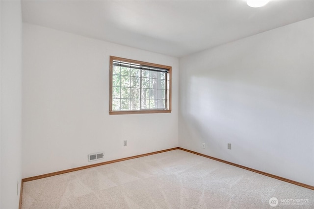 1742 N 122nd St, Seattle, WA 98133 - carpeted spare room featuring baseboards