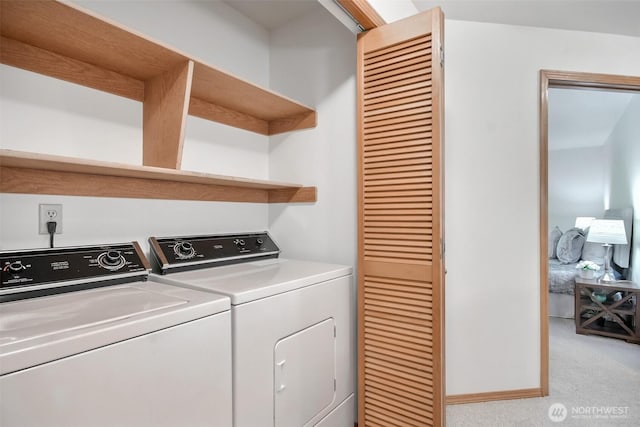 1742 N 122nd St, Seattle, WA 98133 - washroom featuring washing machine and clothes dryer and light carpet