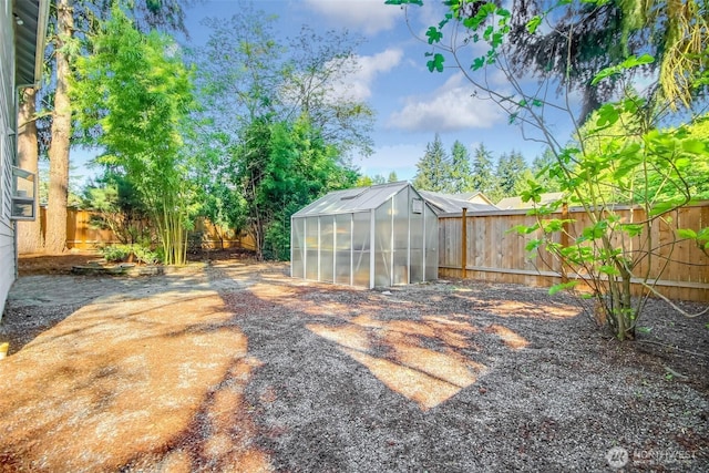 1742 N 122nd St, Seattle, WA 98133 - fenced backyard featuring an exterior structure and an outbuilding