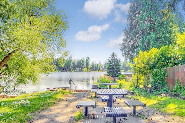 1742 N 122nd St, Seattle, WA 98133 - view of yard with a water view, fence, and a dock