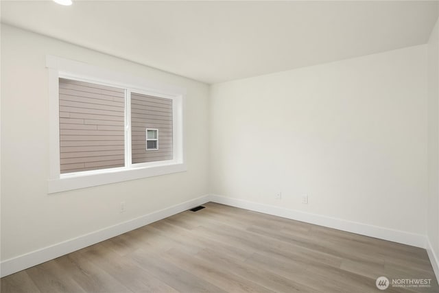 24858 NE 1st Pl, Sammamish, WA 98074 - empty room featuring baseboards, wood finished floors, and recessed lighting
