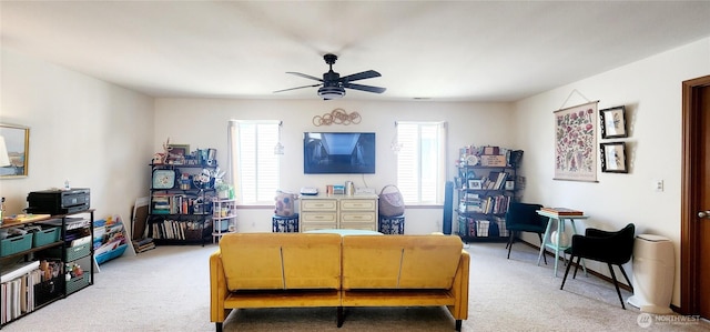 interior space featuring carpet floors and ceiling fan