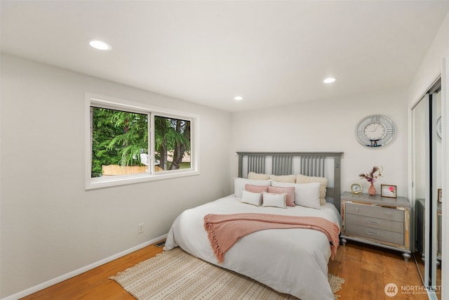 3131 110th St SE, Everett, WA 98208 - bedroom featuring wood finished floors, recessed lighting, a closet, and baseboards