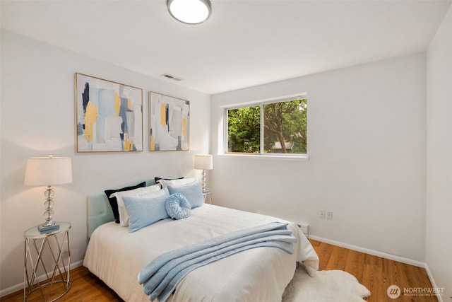 3131 110th St SE, Everett, WA 98208 - bedroom with baseboards and wood finished floors