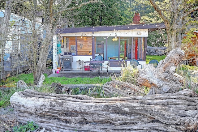 exterior space featuring a chimney