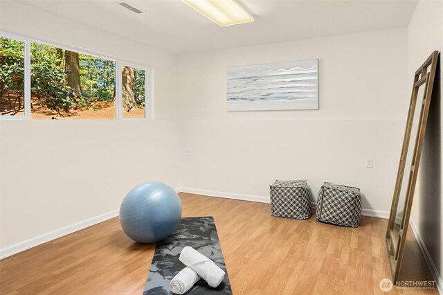 12802 NE 26th Pl, Bellevue, WA 98005 - exercise room with wood finished floors and baseboards