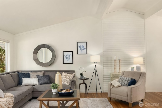 12802 NE 26th Pl, Bellevue, WA 98005 - living area featuring vaulted ceiling, wood finished floors, and baseboards