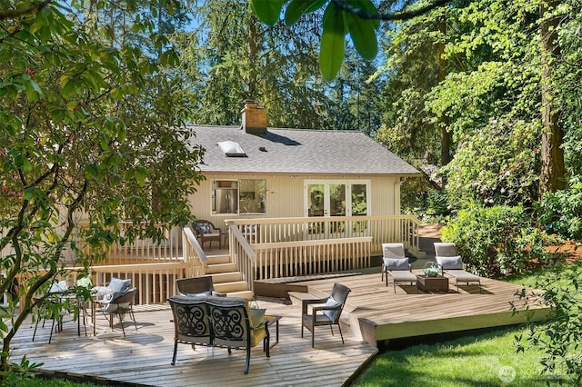 12802 NE 26th Pl, Bellevue, WA 98005 - back of house with an outdoor living space, a chimney, roof with shingles, and a wooden deck
