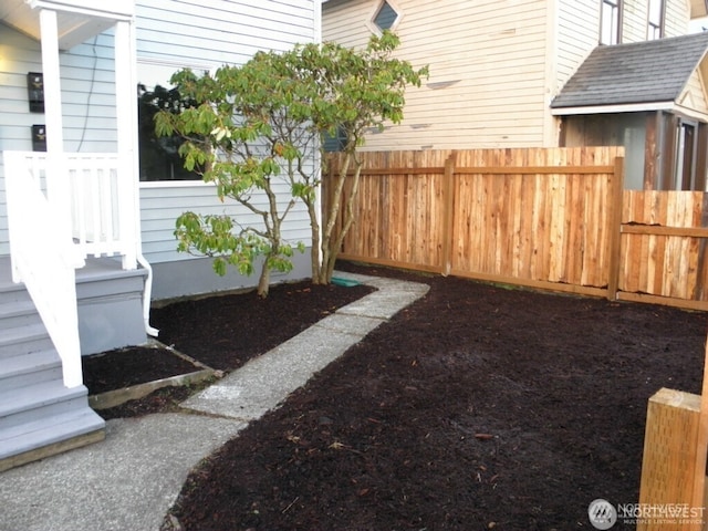 view of yard featuring fence