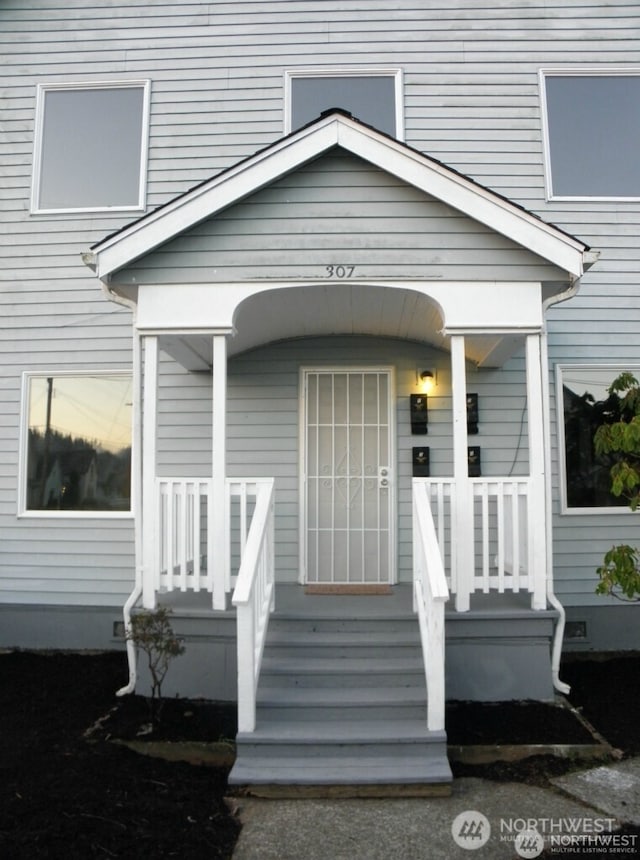 property entrance with a porch