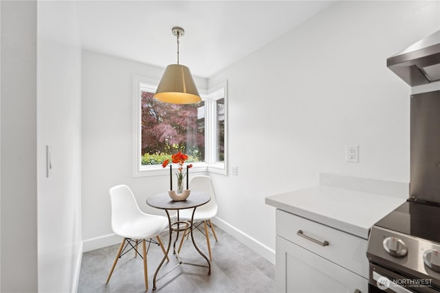 dining room with baseboards