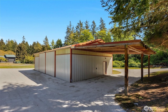 exterior space featuring an outbuilding
