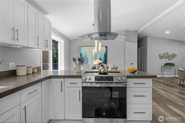 kitchen with white cabinetry, stainless steel electric range, island exhaust hood, and dark wood-type flooring