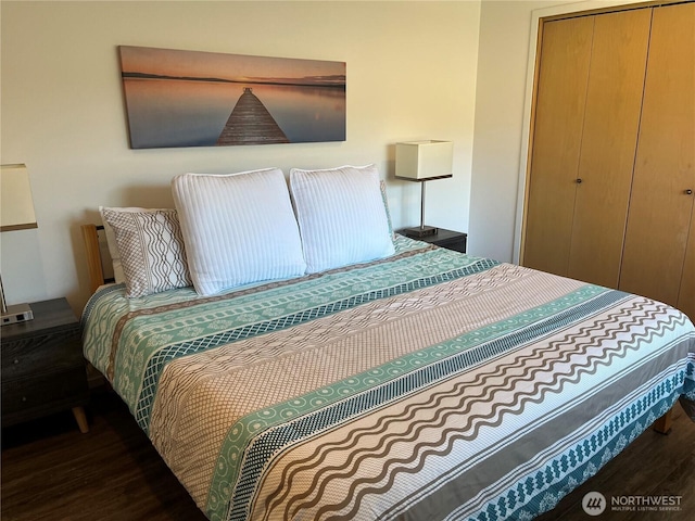 bedroom with wood finished floors