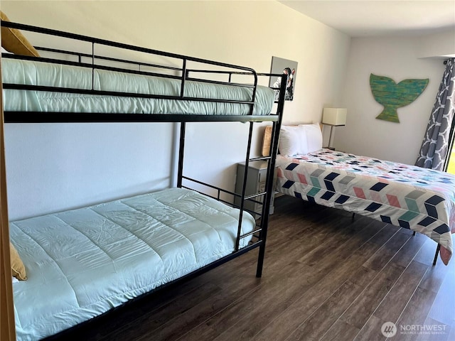 bedroom featuring wood finished floors