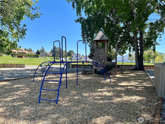 community jungle gym with fence